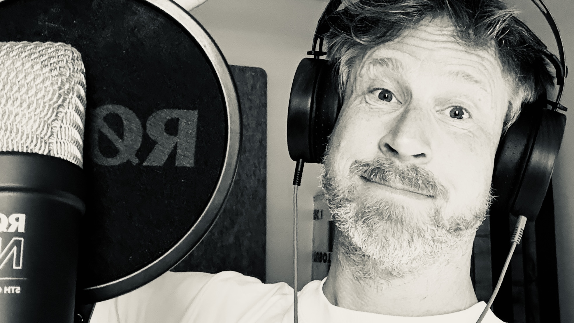 Hazards of Prophecy — Dave Rendle in the studio with microphone and laptop